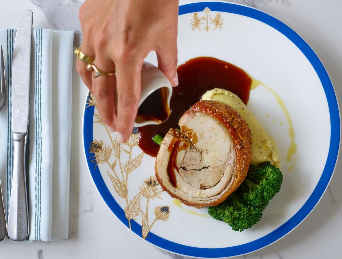 The Mitre, Hampton Court Hotel Kingston upon Thames  Exterior photo A pork tenderloin being served
